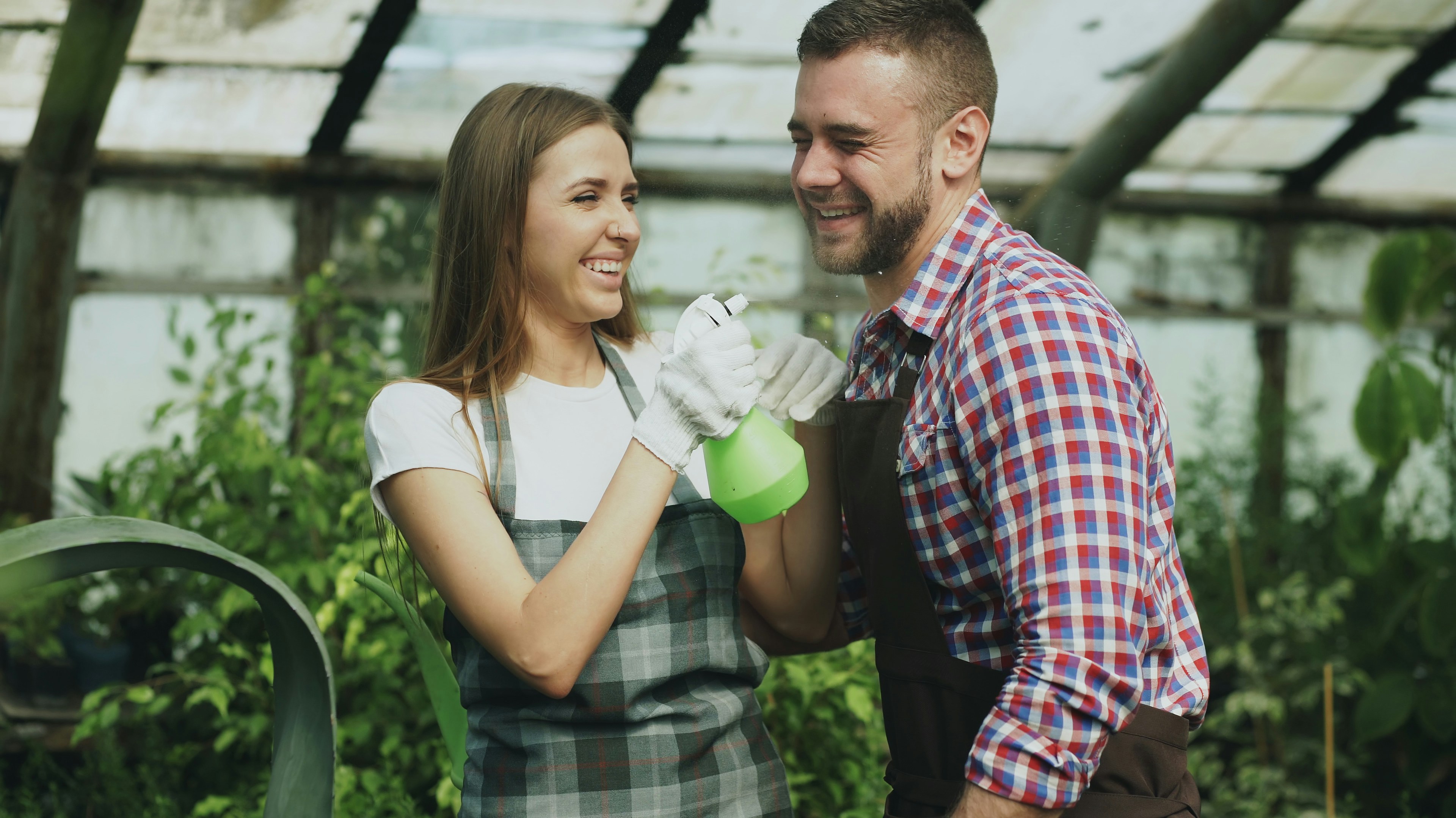 A couple gardening together in a relaxed, everyday outdoor moment